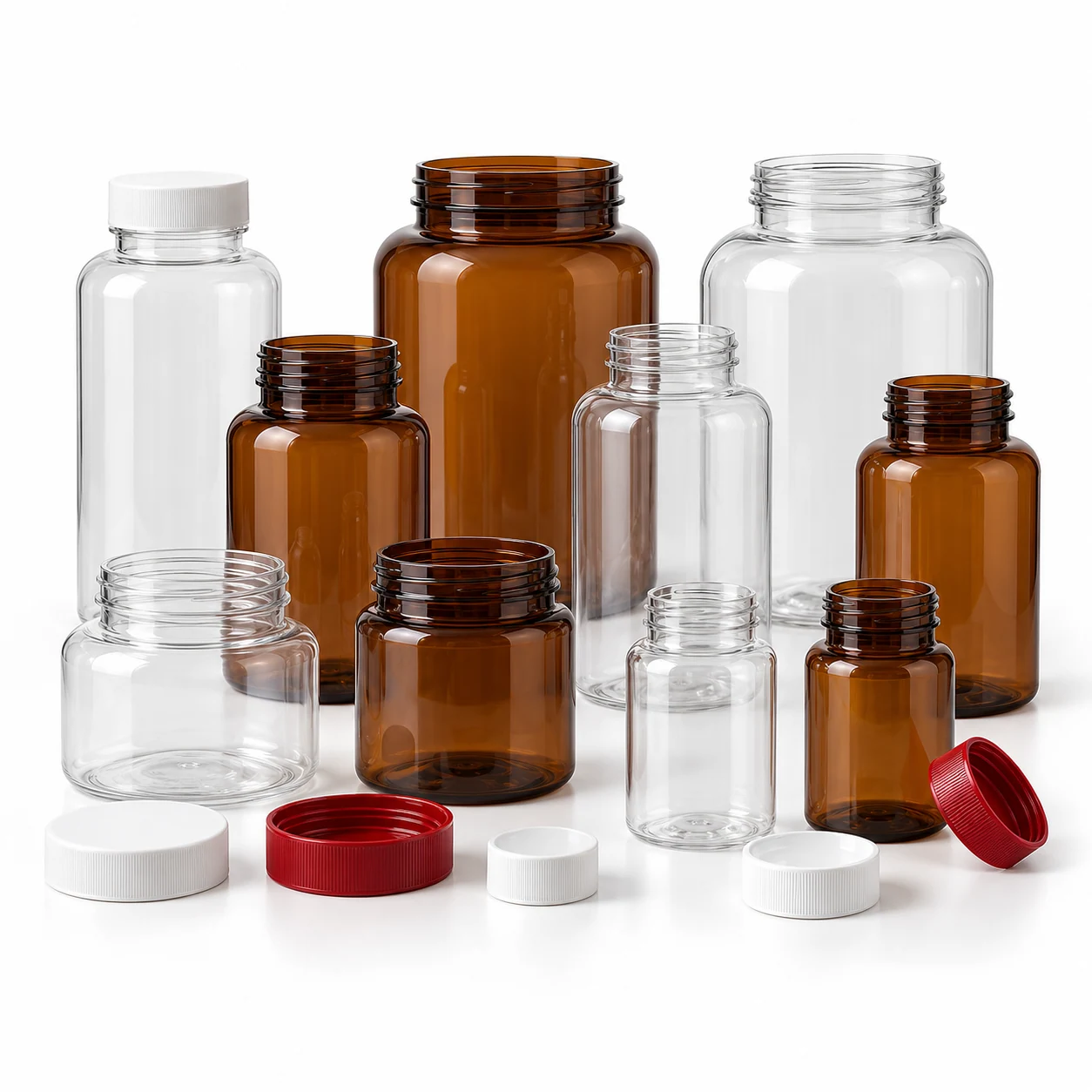 Empty, unlabeled PET packaging bottles in multiple sizes with coordinated caps